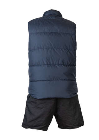 dar blue sleeveless jacket and black summer shorts isolated on white backgroundの写真素材