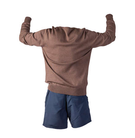 knitted brown sweater and dark blue shorts isolated on white background. fashionable clothes for every dayの写真素材