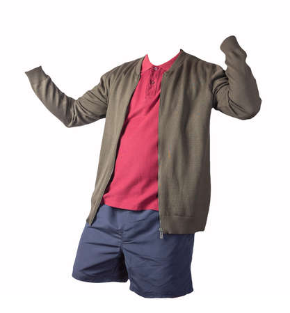 men's dark green knitted bomber jacket, dark red shirt and dark blue sports shorts isolated on white background. fashionable casual wearの写真素材