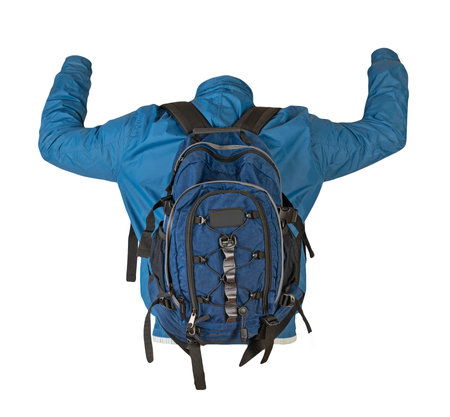 blue backpack dressed in blue windbreaker isolated on a white background. rear view of a backpack and jacketの写真素材