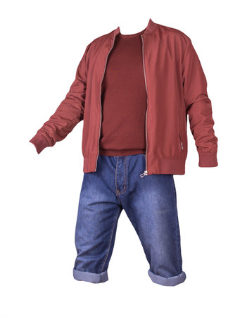 Denim blue shorts, dark red sweater and red bomber jacket on the zipper isolated on white backgroundの写真素材