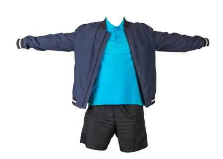men's dark blue bomber jacket, blue shirt and black sports shorts isolated on white background. fashionable casual wearの写真素材