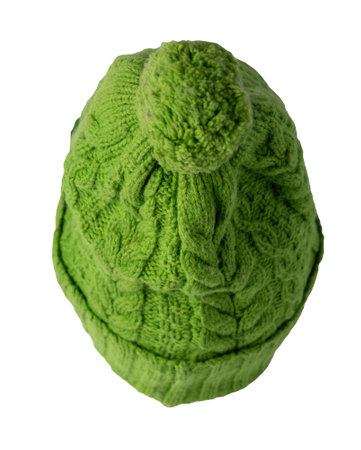 knitted green hat isolated on white background.hat with pompon .の写真素材