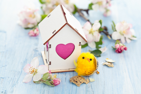White Wood houses with colorful heart shaped windows.の写真素材