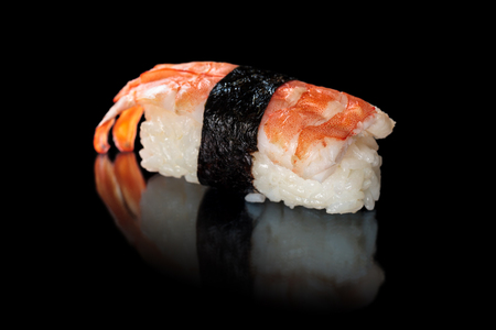 Tiger shrimp sushi on a black backgroundの写真素材