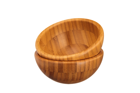 Brown wooden  bowl isolated on whiteの写真素材