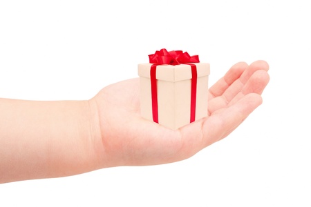  Present for a birthday or other holiday - beige box with a red satin bow.Isolated on white background.の写真素材