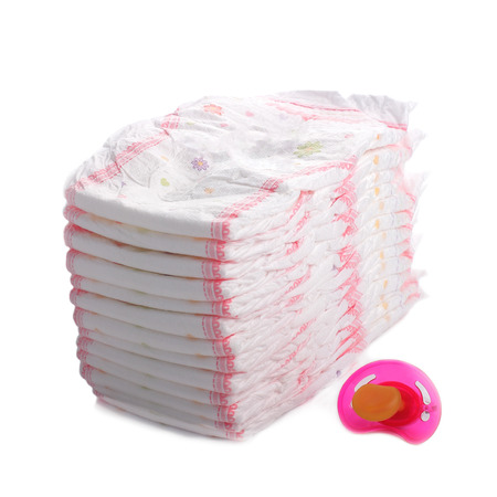 Stack of diapers isolated on whiteの写真素材