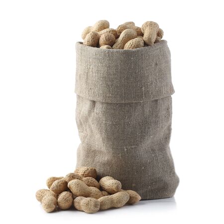 Peanuts in burlap sack isolated on white background