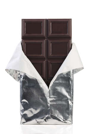 Dark chocolate bar isolated on white backgroundの写真素材