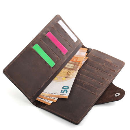Brown leather wallet with euro banknotes isolated on white backgroundの写真素材