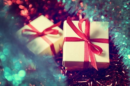 Gift boxes with red ribbon on abstract backgroundの写真素材