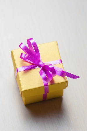 Gift box with pink ribbonの写真素材