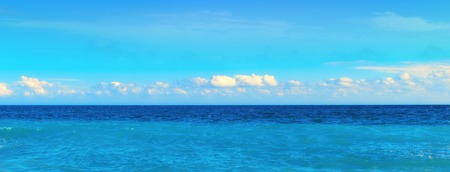 Idyllic blue sea and sky during summer dayの写真素材