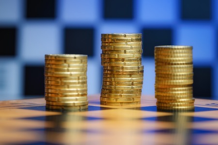 Euro coins on chess board