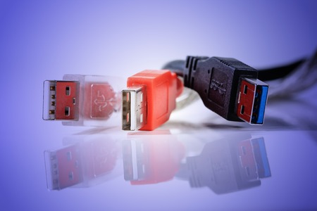 Computer USB Cables against blue 
