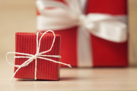 Close up of gift boxes on wooden background