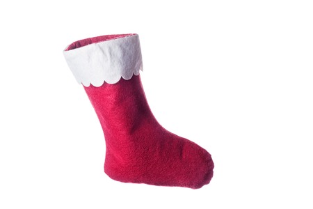 Empty red Santa sock isolated on whiteの写真素材