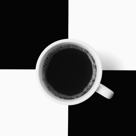 Flat lay of coffee cup, black and white photoの写真素材