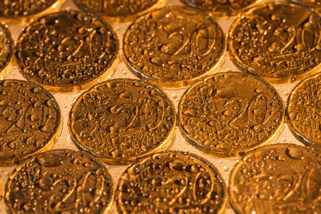Euro coins with water dropsの写真素材