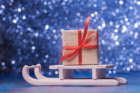 Santa's sledge over abstract defocused lightsの写真素材