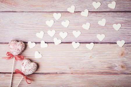 Valentines day concept with hearts composition on old wooden backgroundの写真素材