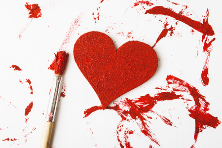 Valentineâs hearts painting with red dyeの写真素材