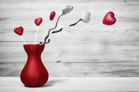 Still life with Valentines hearts in red jugの写真素材