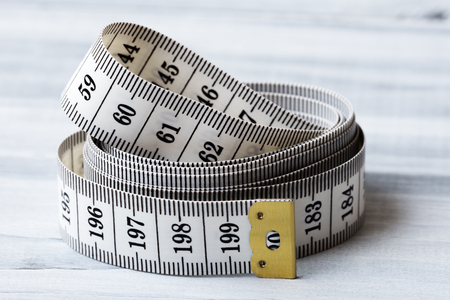 Close up of white measuring tape