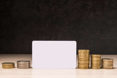 Template of blank plastic card with copy space and Euro coinsの写真素材
