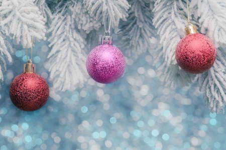 Christmas balls over blue holiday lights. Xmas and New Year conceptの写真素材