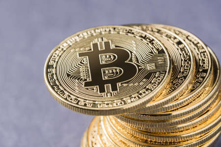 Close up of metal bitcoins stack