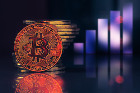 Bitcoin coins stack over defocused upward chart. Cryptocurrency conceptの写真素材