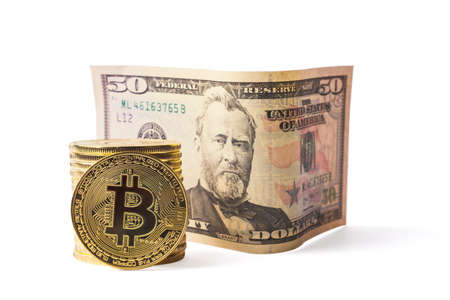 50 USD banknote and bitkoins stack, isolated on whiteの写真素材