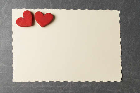 Blank paper card and red Valentines hearts. Valentines day greetingの写真素材