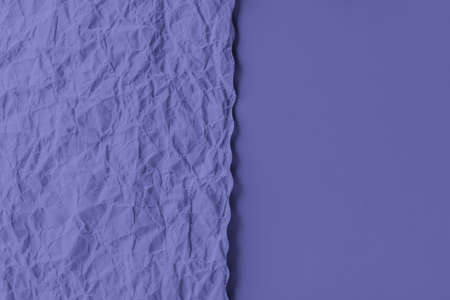 Crumpled and flat paper sheets. Very peri pepper backgroundの写真素材