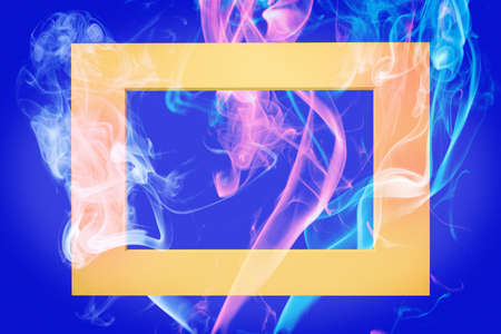Colorful smoke in frame over blue backgroundの写真素材