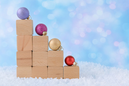 Christmas background with Xmas decoration on wooden blocks. New Year holiday conceptの写真素材