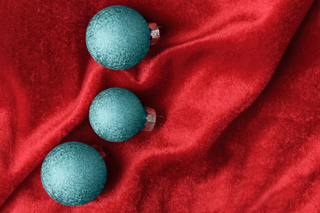 Christmas decorations on red fabric. New Year and Xmas backgroundの写真素材