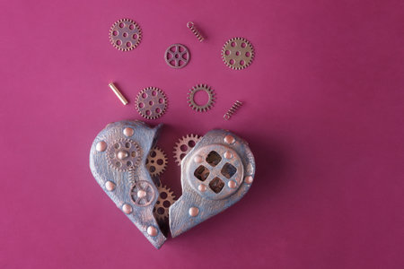 Broken heart and gears in steampunk style. Love and Valentineâs day idea. Concept of broken relationshipの写真素材