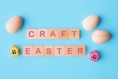 Craft template of wooden eggs and wooden blocks with Craft Easter lettering. DIY Easter decorationsの写真素材