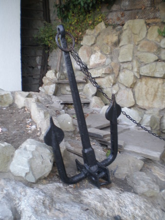 Anchor lying on a rockの写真素材