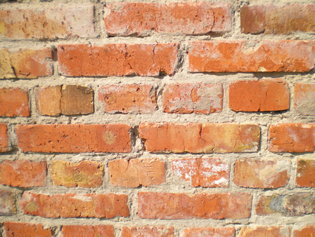 View of the wall of an old crumbling brickの写真素材