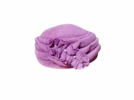 Women's woolen pink cap isolated on white backgroundの写真素材