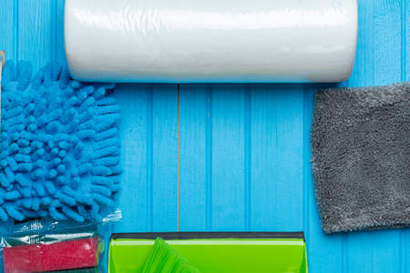 Sponge, rags for home cleaning close-up with copy space