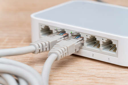 Network wires connected to the switch, router close upの写真素材