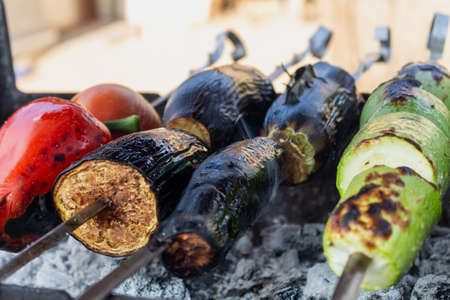 Vegetables on the grill cooking process barbecue, vegetarian foodの写真素材