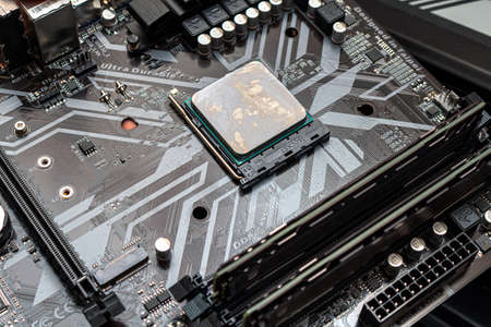 Powerful CPU with applied thermal grease on a personal computer. The process computer maintenance...