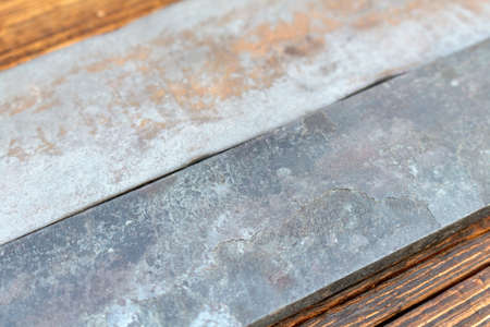 Blade steel plates handmade knife making materials supply tempered forged hardened heat treated quenched hard-tempered close up selective focusの写真素材