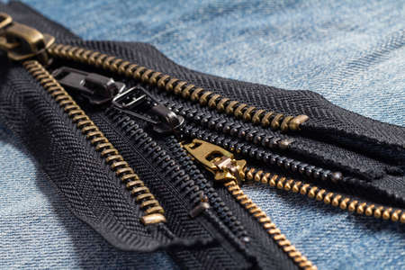 Pack a lot of black metal brass zippers stripes with sliders pattern for handmade sewing tailoring...